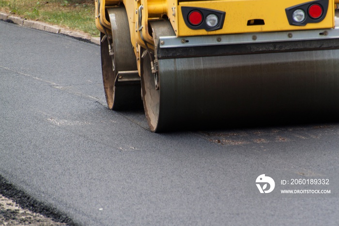 New asphalt road. Road asphalt works. Construction works.