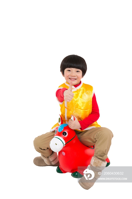 棚拍中国新年唐装儿童拿糖葫芦骑小马