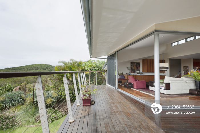 Balcony and living room in contemporary house