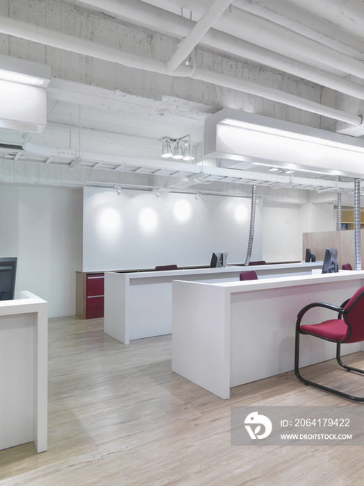 Desks and whiteboard in office