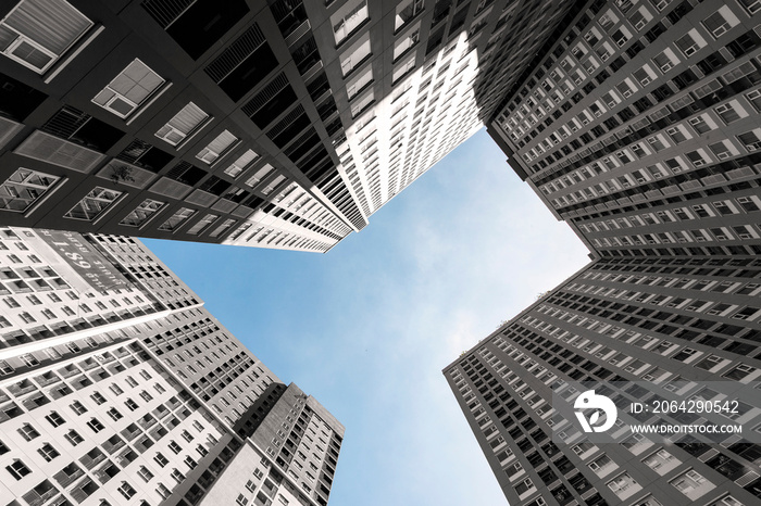 Looking up at condominium to sky in perspective view Architecture.