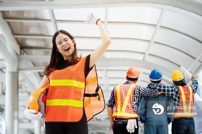 Asian female chiefs are delighted to have Team Construction asian workers are both engineers and bui