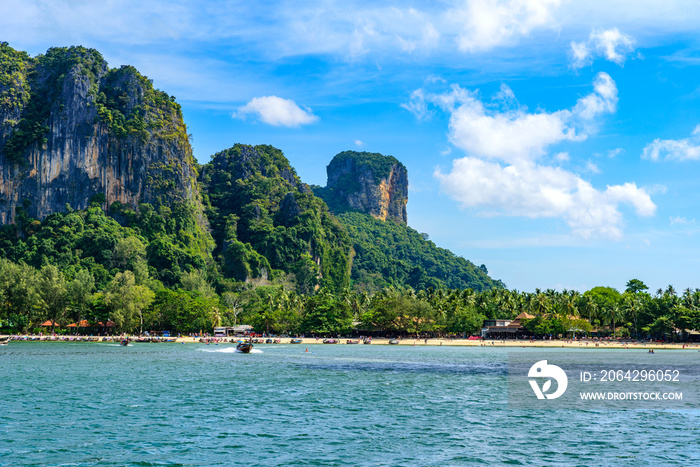 Railay West Beach with beautiful rock formation and landscape scenery in Krabi province - tropical c