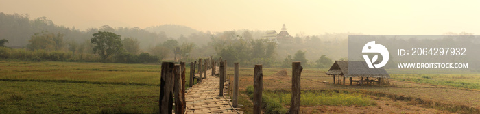 panoramic views of traditional farm land and crops spreading out into the distant mountains of North