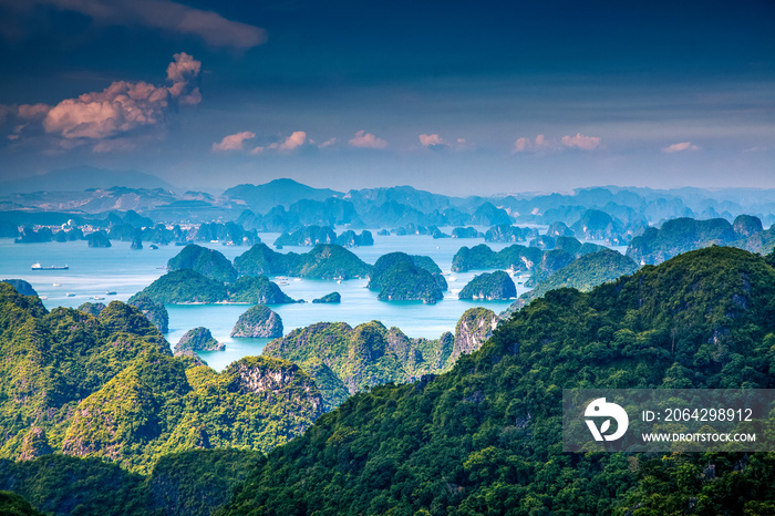 scenic view over Ha Long bay from Cat Ba island, Ha Long city in the background, UNESCO world herita