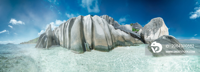 Amazing panoramic view of Anse Source Argent from the sea. La Digue, Seychelles