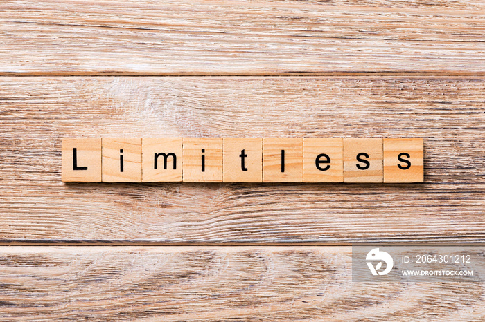 Limitless word written on wood block. Limitless text on wooden table for your desing, concept