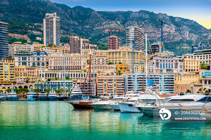 Luxury yachts and apartments in harbour of Monaco, Cote dAzur.