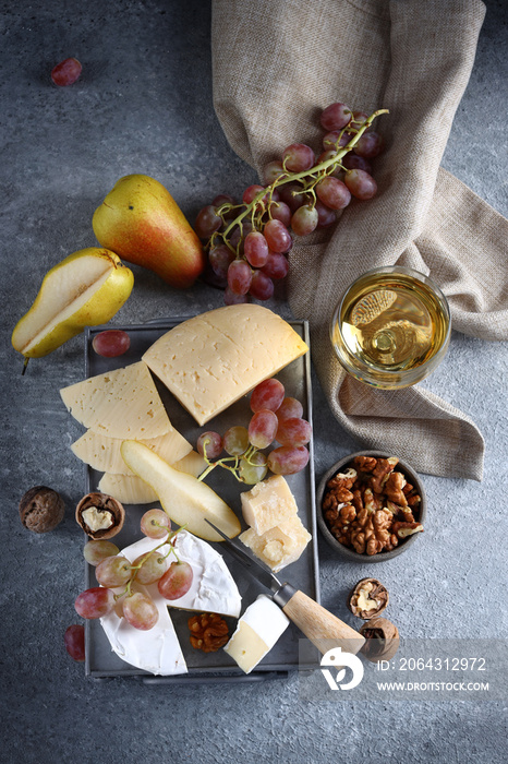 cheese board with grapes and nuts