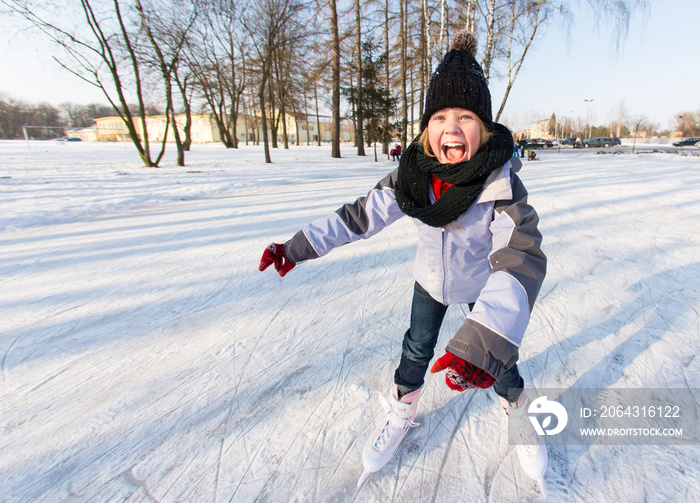 skates at an ice rink,  winter sport and leisure concept.