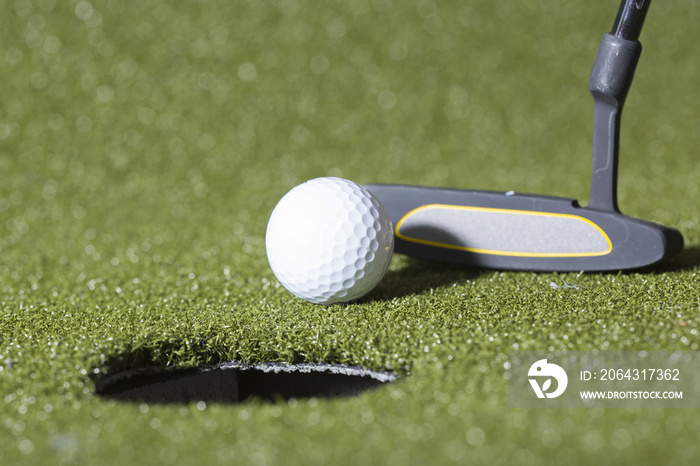 Golf concept image. Close up shot of putting.