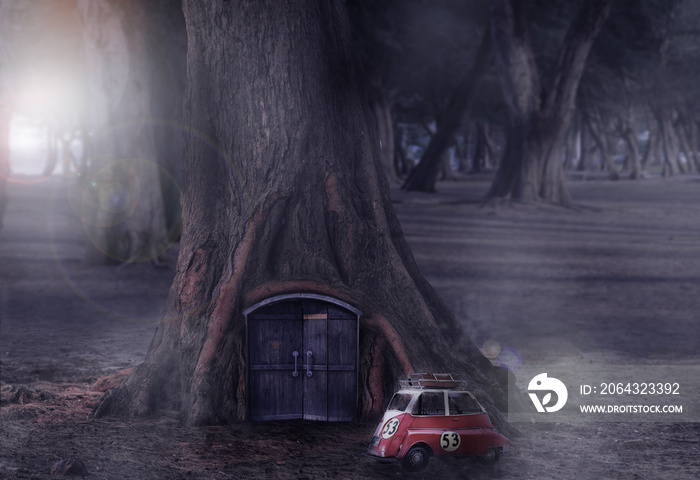 A small vintage car Park in front of the fantasy tree house in the forest.