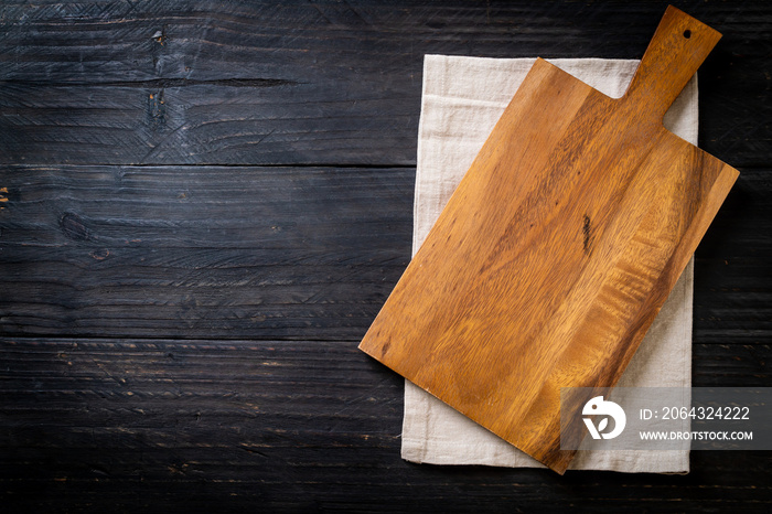 empty cutting wooden board with kitchen cloth