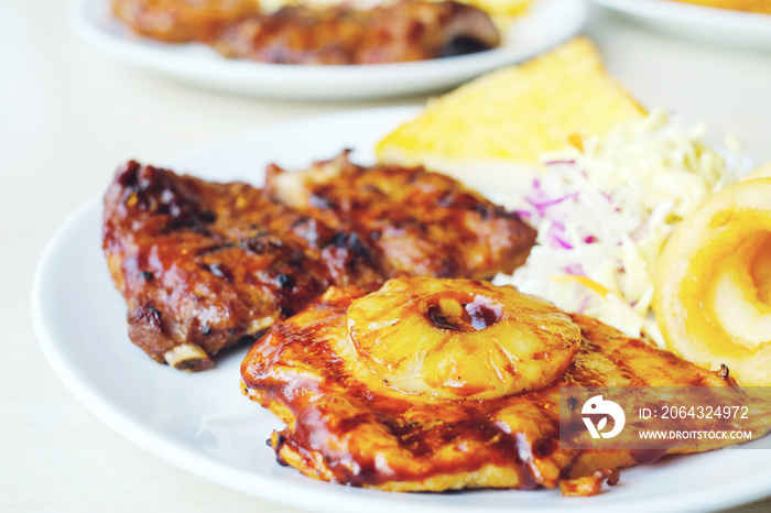 chicken grill steak ontop pineapple and serve with salad, toast bread