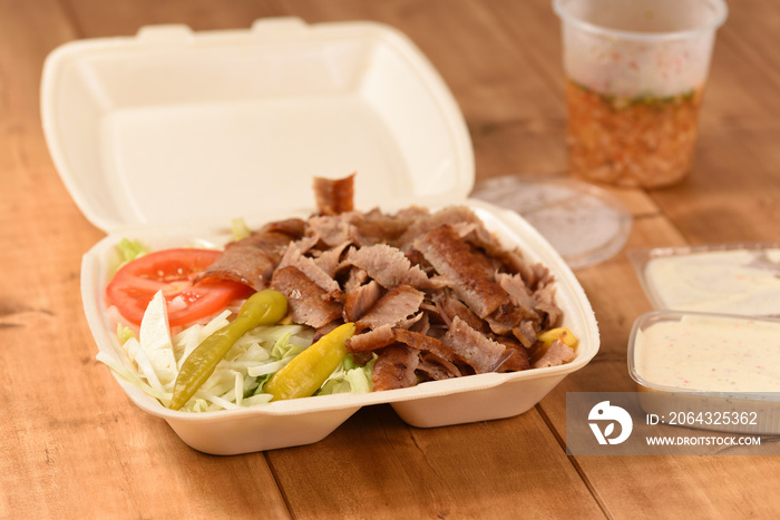 Doner plate to take away in Germany, Turkish fast food in a plastic box