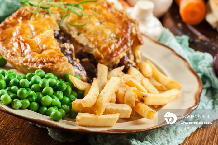 Homemade beef stew pie with french fries