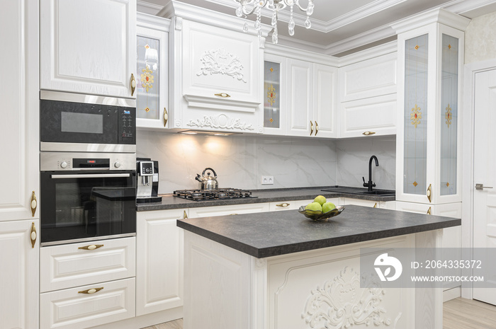 White luxury modern kitchen with island