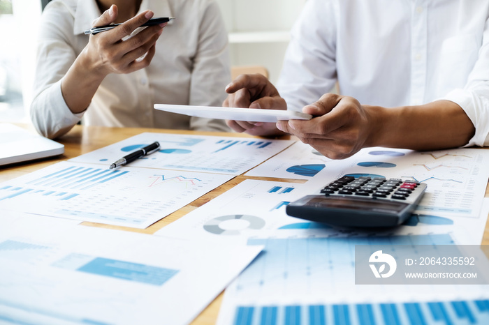 Financial inspector calculating a numbers in office room.