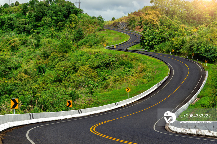 Road no.3 or sky road over top of mountains with green jungle in Nan province, Thailand.