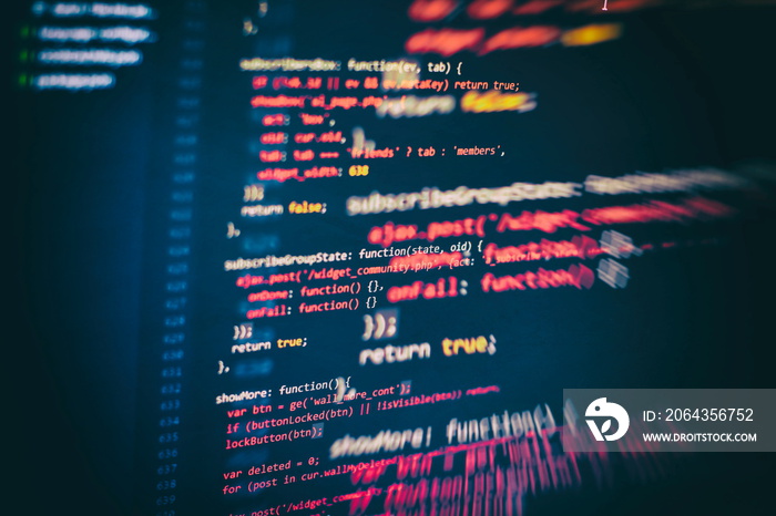 CSS, JavaScript and HTML usage. Monitor closeup of function source code. Abstract IT technology back