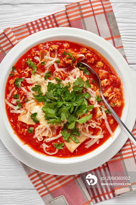 close-up of chicken lasagna soup in a bowl