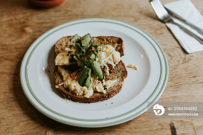 Eggs and veggies on a toast