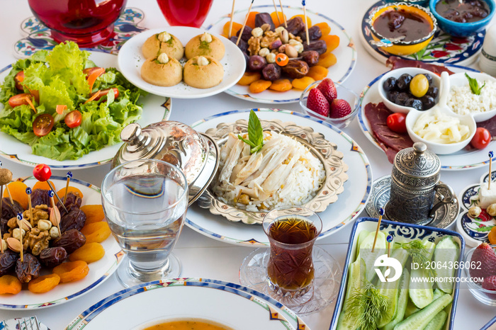 Traditional Ramadan Dinner Table with iftar large menu.Conceptual image of Ramadan Feast.