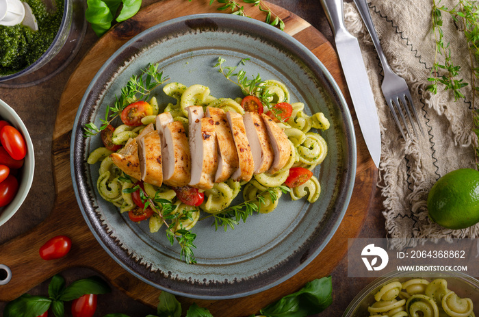 Homemade pesto pasta with grilled chicken