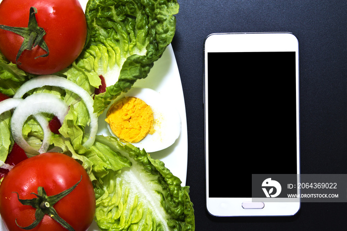 salad of tomato and mobile phone