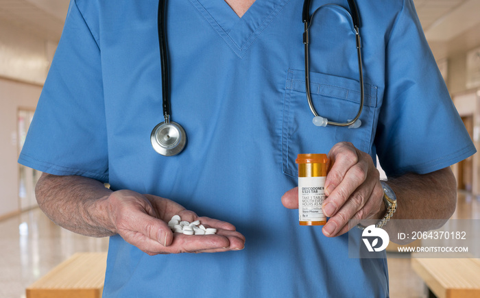 Generic oxycodone tablets in hands of doctor - this is not a trademarked drug