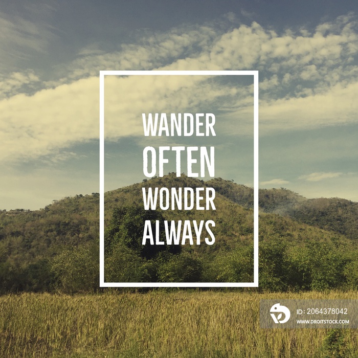 Inspirational motivational quote  wander often, wonder always  on mountain background.