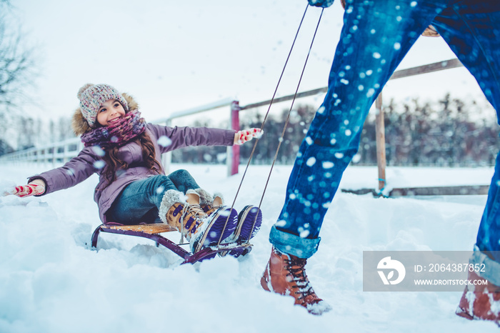 Dad with daughter outdoor in winter