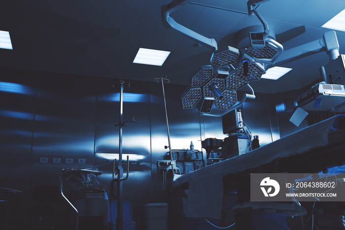 Gloomy colors of a night operating room ready to receive a patient