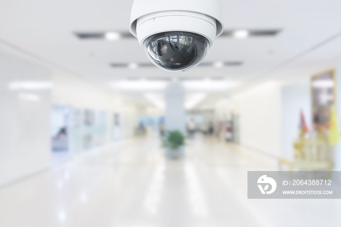 CCTV Security Camera operating in hospital on blur background.