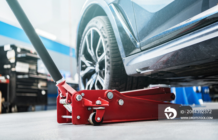 Modern Vehicle and the Floor Jack Lift Vehicle Maintenance