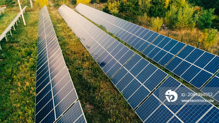 Aerial view of solar panels on field