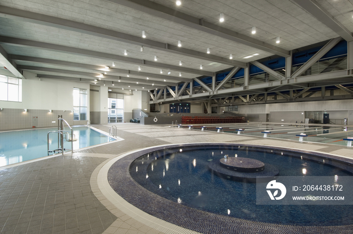 Indoor pools with fountain in health club