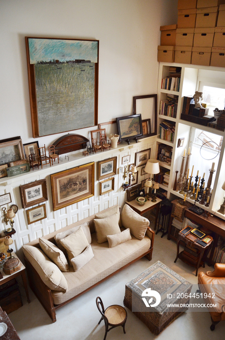 High angle view of sofa and armchair in middle class living room