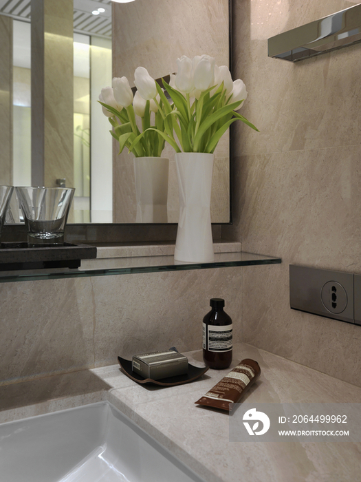 Flower vase in bathroom of hotel