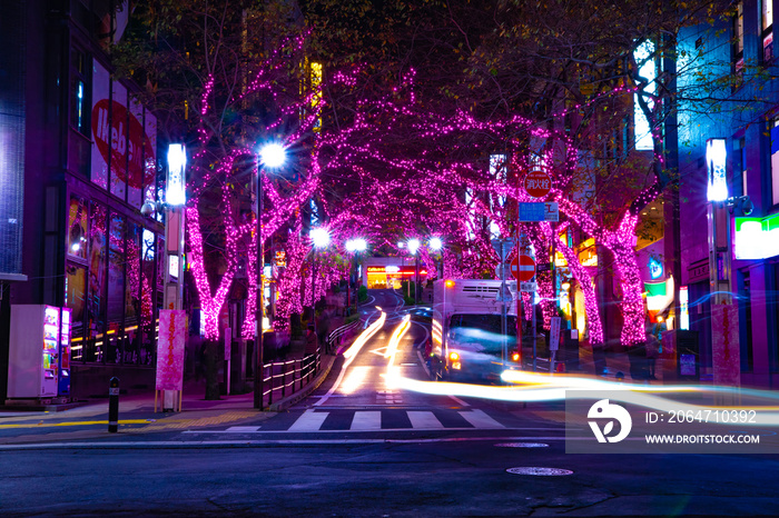 A night illuminated street in Shibuya middle shot