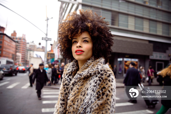 Young woman standing on street