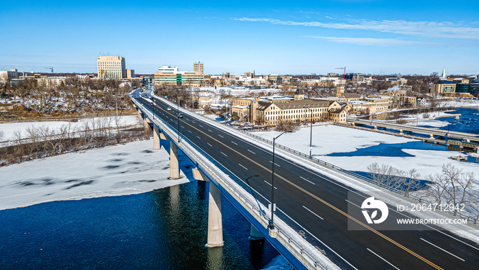 Snow covers landscape into the city