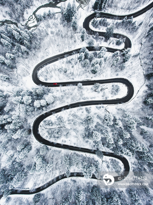 Extreme winding road in the mountains in wintertime