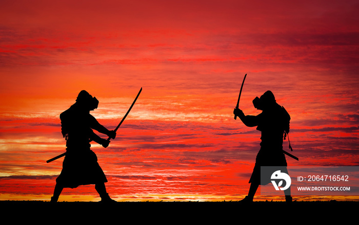 Silhouette of samurais in duel. 