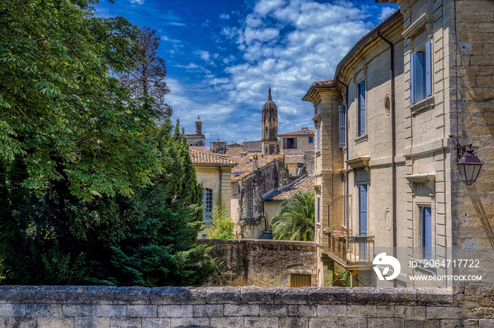 Old medieval stone buildings in the city of Uzes, in the Gard Department of France