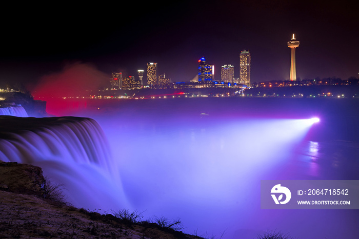 Violet light shining on Niagara Falls 