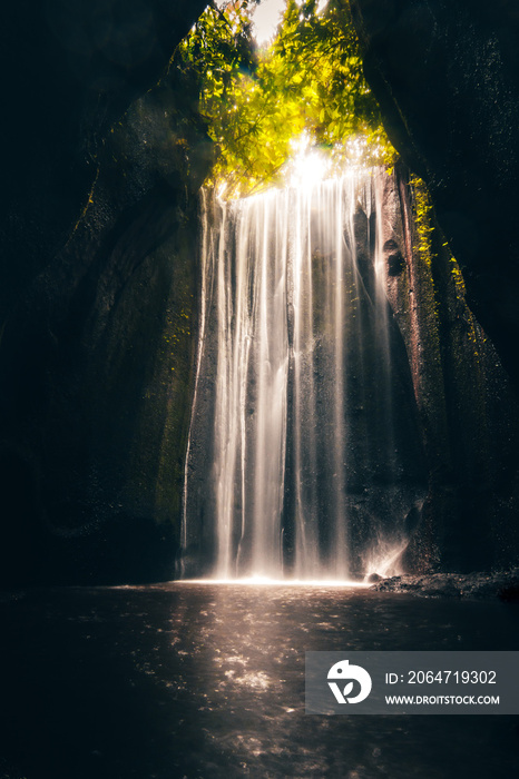 .Waterfall in nature. Nice long exposure of a waterfall, a river cascading down a rock.