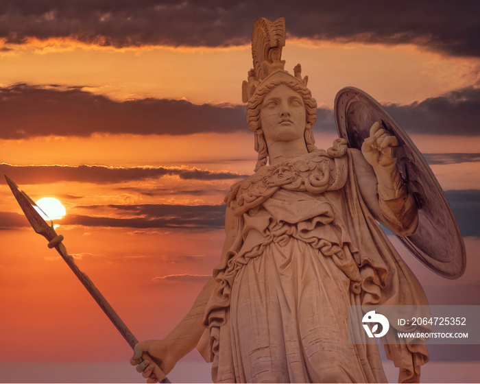 Athena statue the ancient Greek goddess of wisdom and knowledge illuminated by dramatic sun burned s