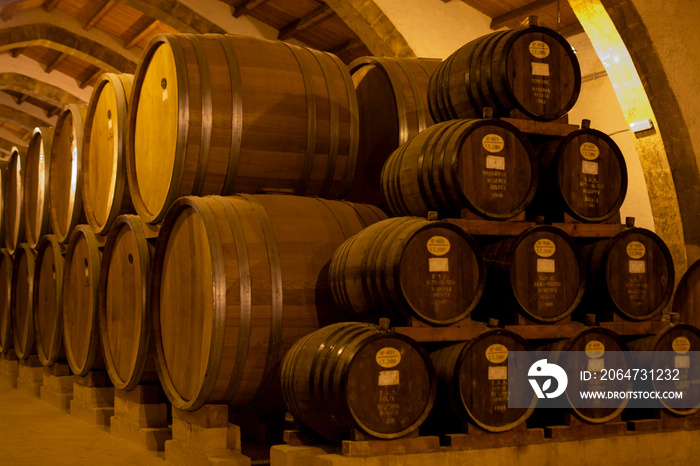 Vintage wine cellar with old oak barrels, production of fortified dry or sweet marsala wine in Marsa