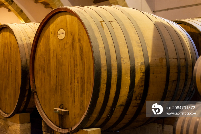 Vintage wine cellar with old oak barrels, production of fortified dry or sweet marsala wine in Marsa